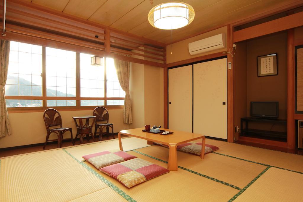 Honkan Gentaroya Hotell Nozawaonsen Rum bild